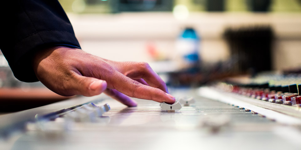 worker operating a switch board after receiving Australia work visa